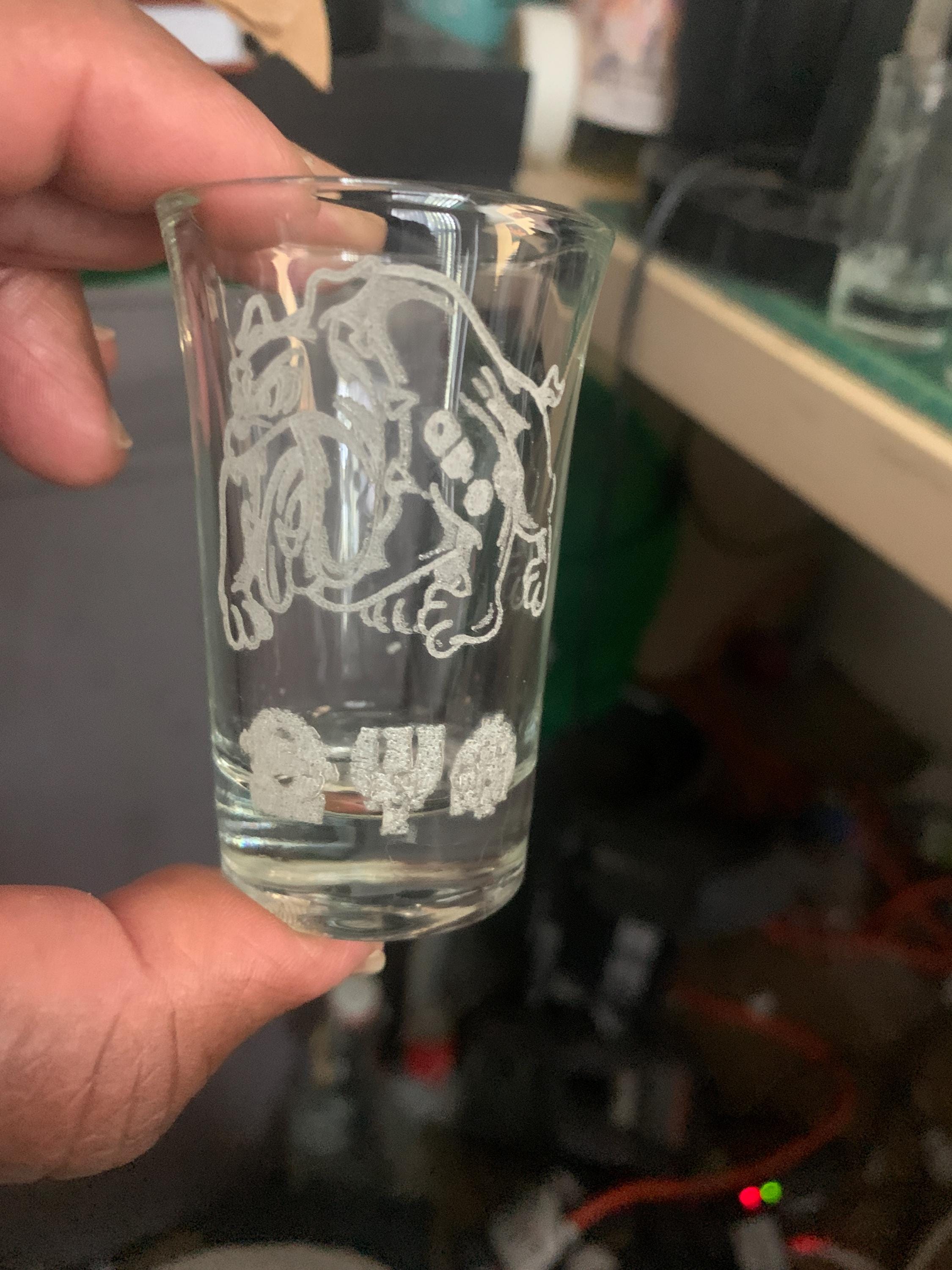 Omega Shot Glass
